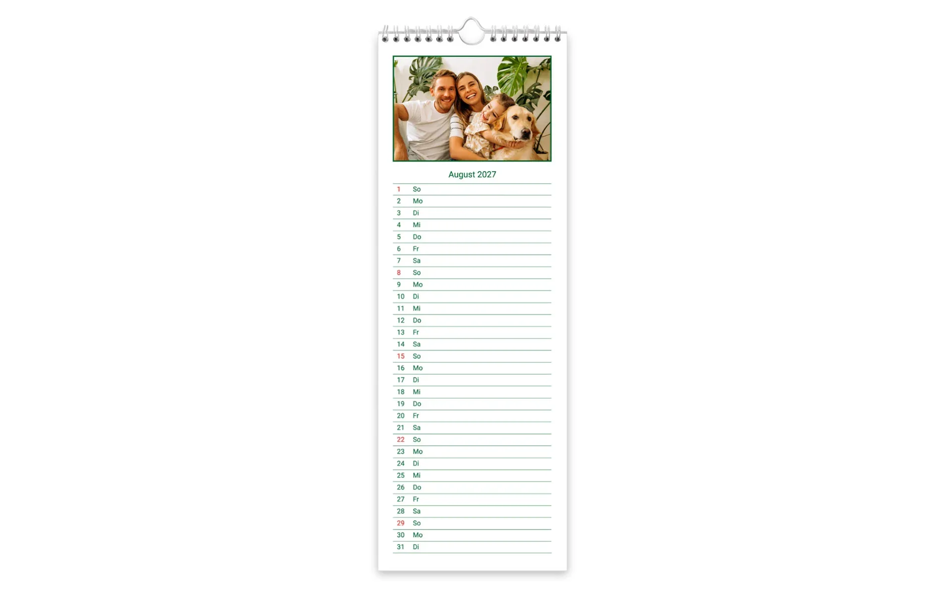 Küchenkalender Ein Küchenkalender zeigt eine Familie mit Hund in einem grünem Rahmen vor weißem Hintergrund.
